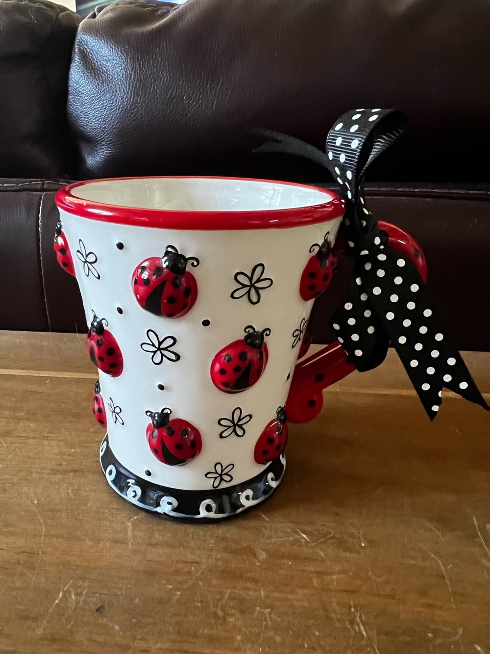 Burton , Burton raised Ladybug coffee mug. 10oz. New and unused.